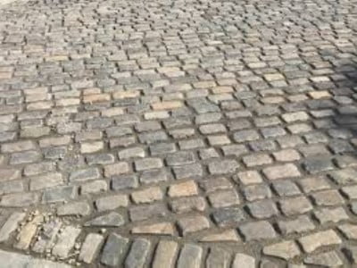 Brighton Paving Contractors Laying Cobblestones in Brighton